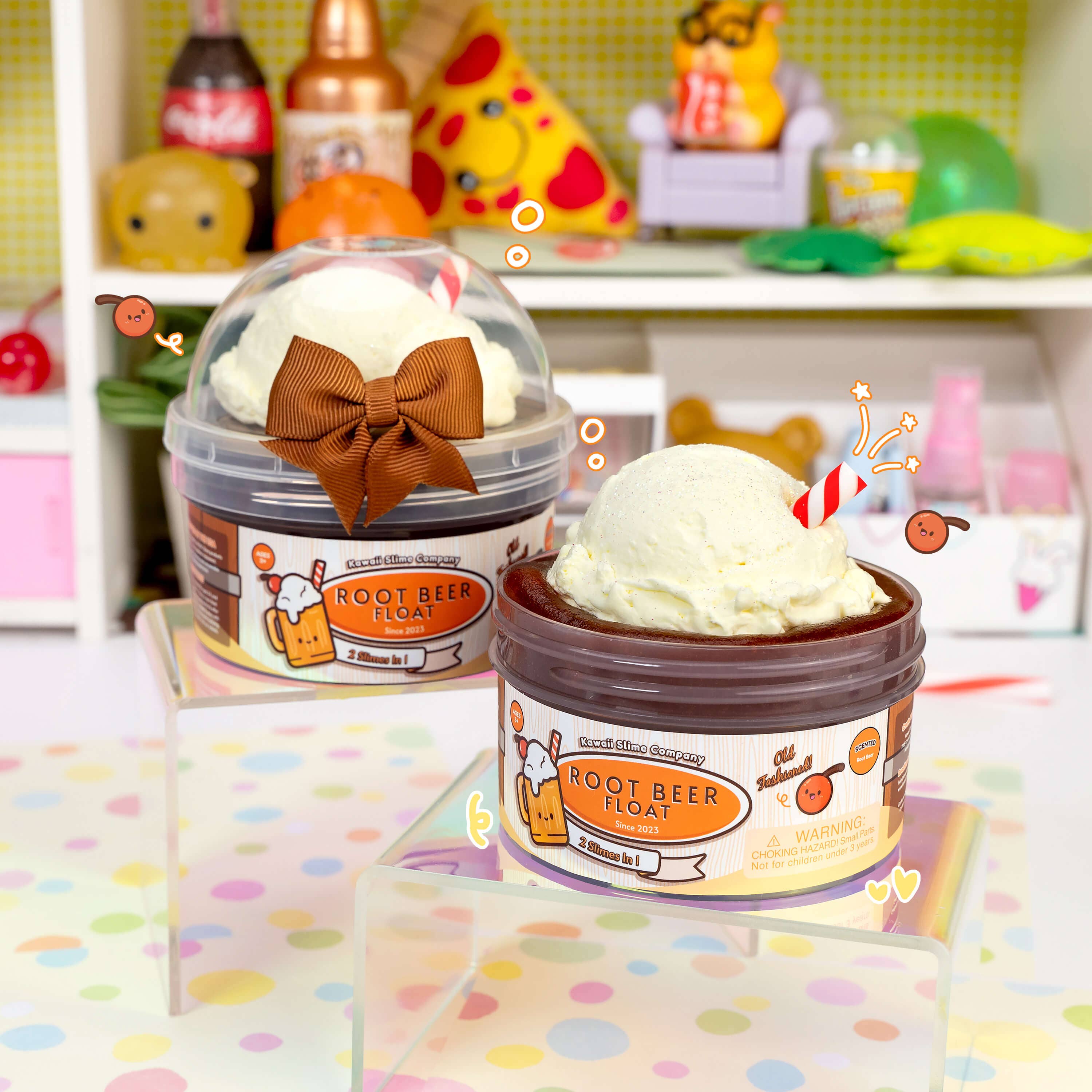 A glossy slime container with a brown bow, a scoop of ice cream clay topper, and a toy kitchen setting, embodying the Root Beer Float 2 Slimes In 1 product theme.