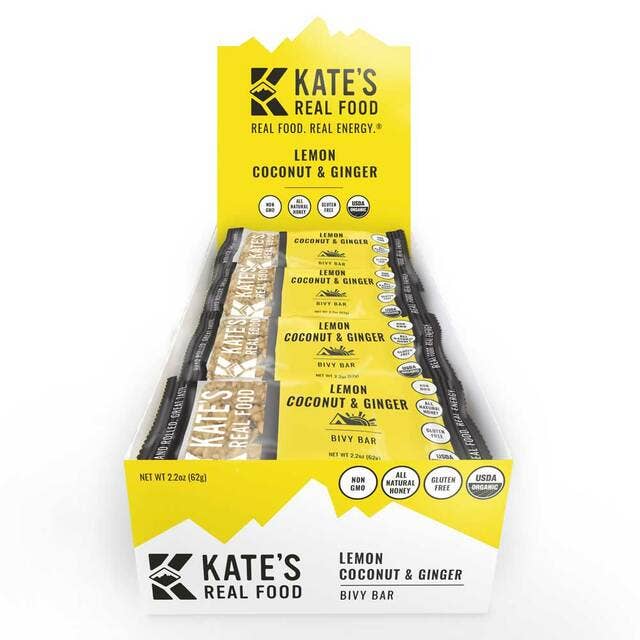 A box of Kate's Real Food Bivy Lemon Coconut Oat Bars, 2.2oz, gluten-free, non-GMO, and USDA organic. Nutrient-packed with ginger, coconut for heart health, and lemon for digestion support.