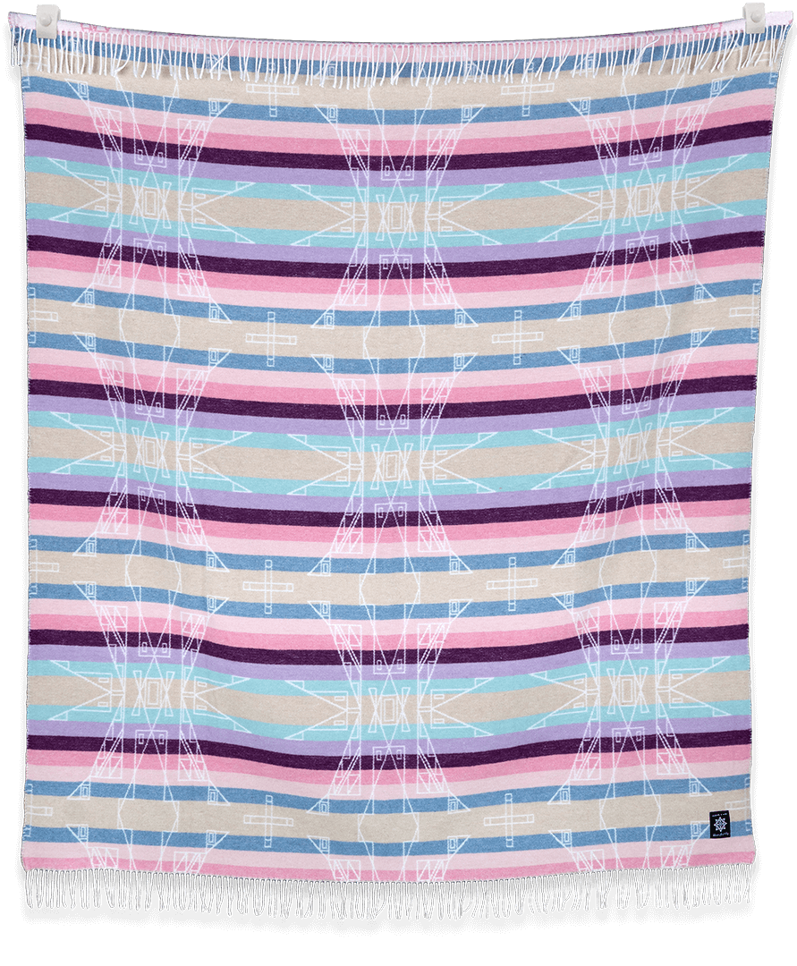 A close-up of Seasons Designed by Lauren Good Day blanket, showcasing intricate stripes and textures. Made from recycled materials in a sustainable process. Size: 72”l x 60”w.