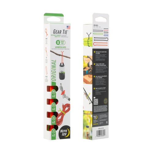 A box featuring Gear Tie Reusable Rubber Twist Ties - 8 Pack, alongside a tie, drink bottle, and brochure. Organize with versatile twist ties for various tasks.