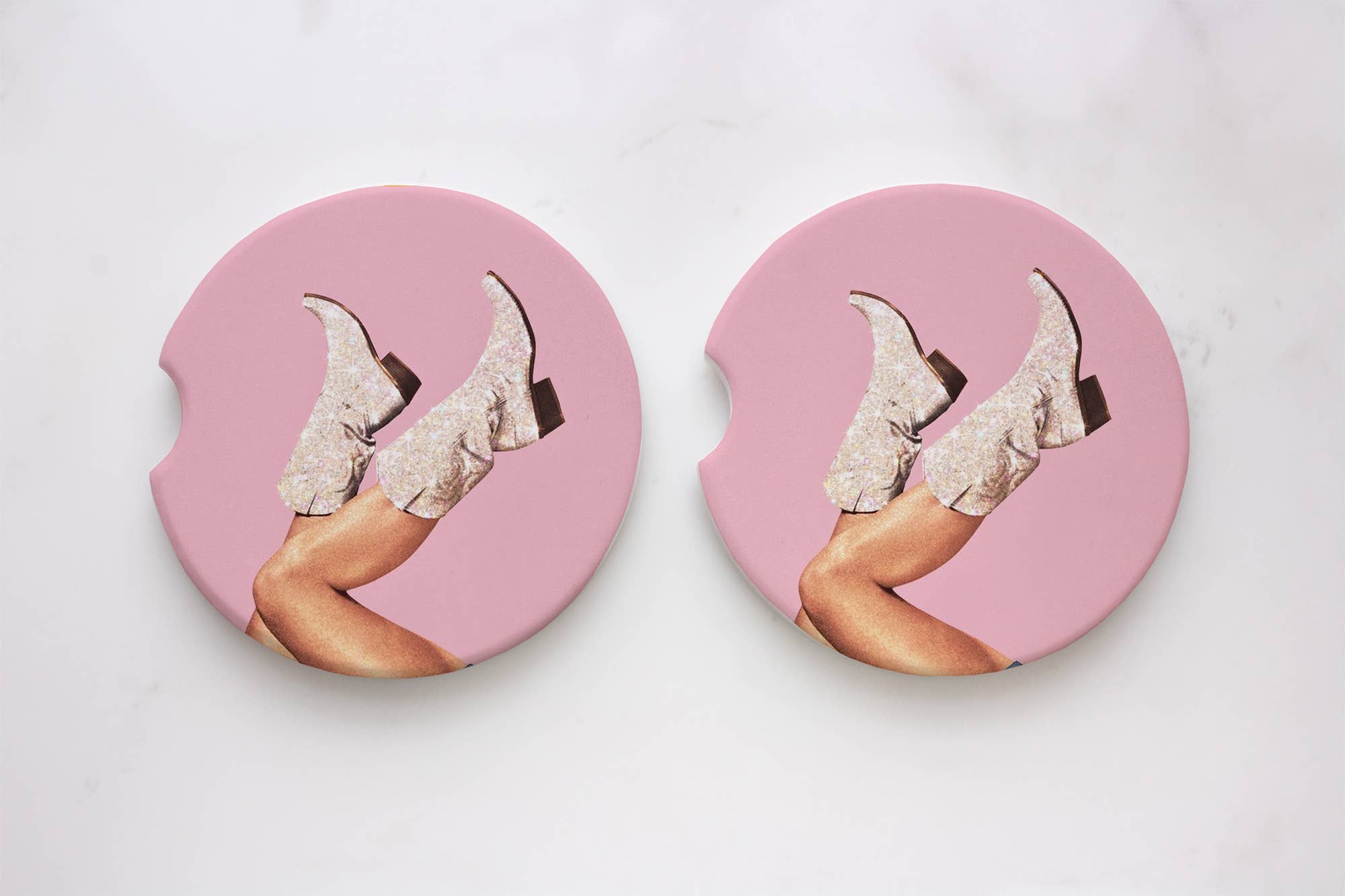 Glitter Cowgirl Boots Car Coasters: A pair of pink car coasters featuring boots with glitter. Absorbent neoprene material with a durable print. Size: 2.6 x 0.125. Set of 2.