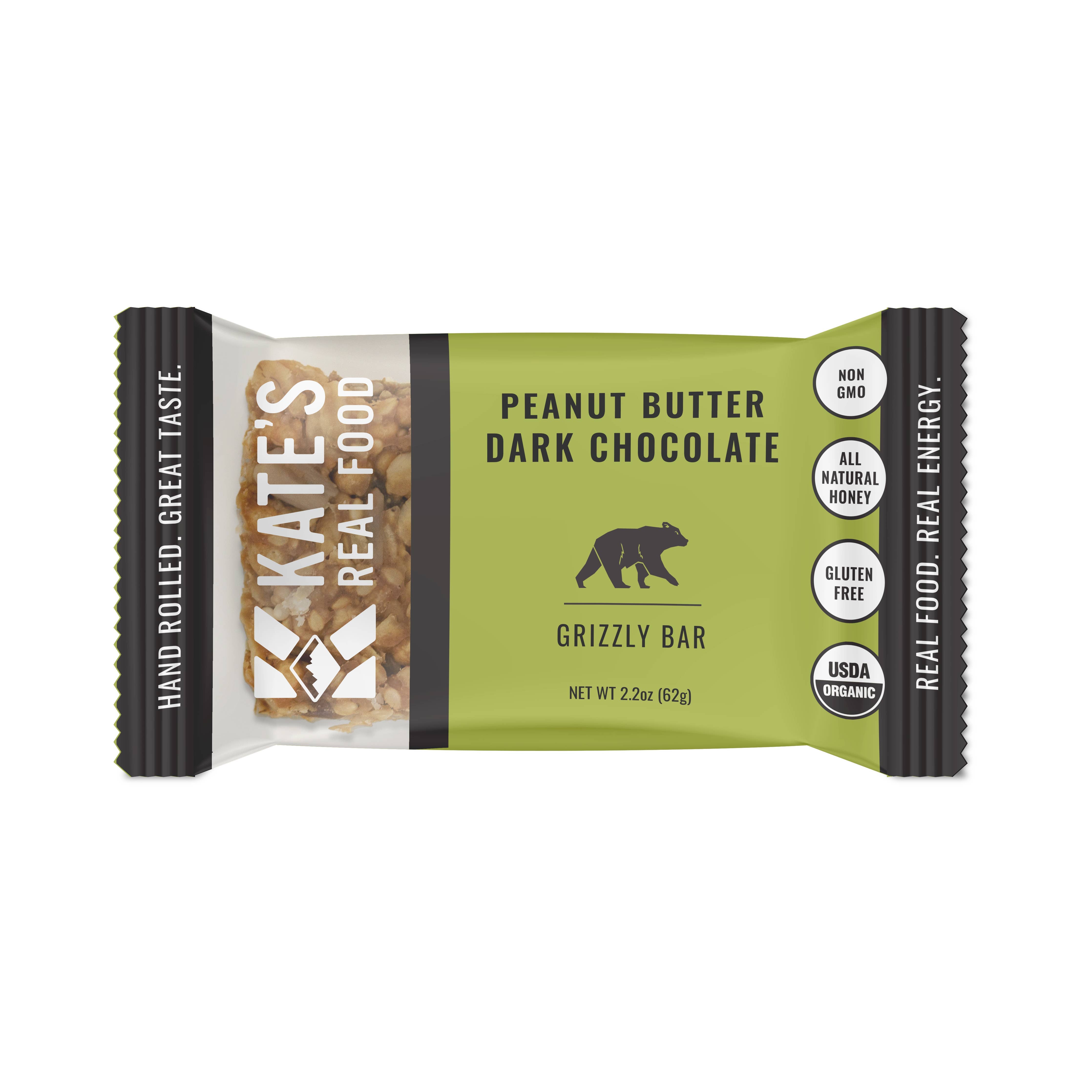 Organic Grizzly Bar: Dark chocolate, honey, sunflower seeds, raisins. Gluten-free, non-GMO, USDA-certified. Package featuring label, green can, and bear image.