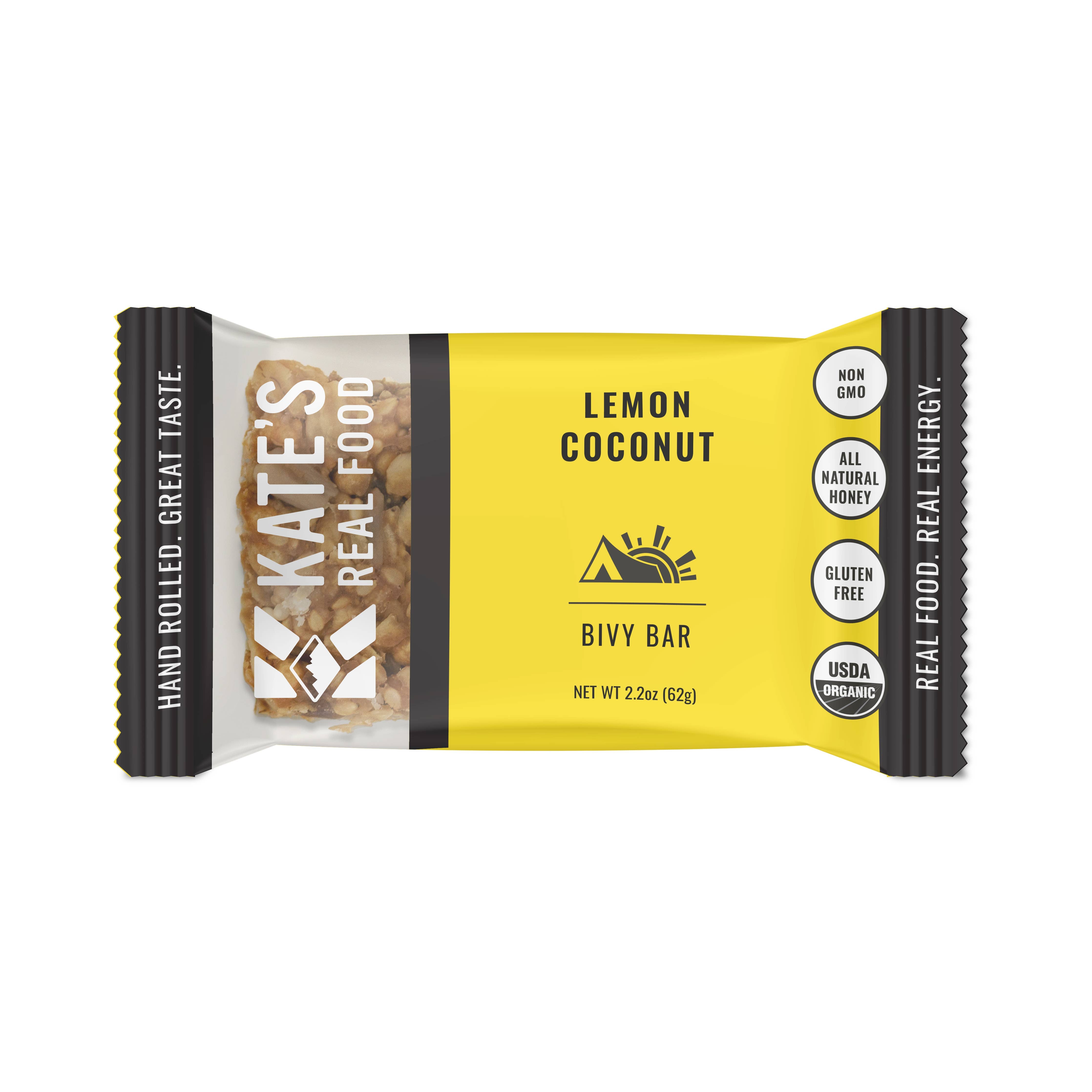 Organic Kate's Real Food Bivy Lemon Coconut Oat Bar 2.2oz, a yellow and black package of gluten-free, non-GMO goodness with ginger, coconut, and lemon for nutritious adventures.