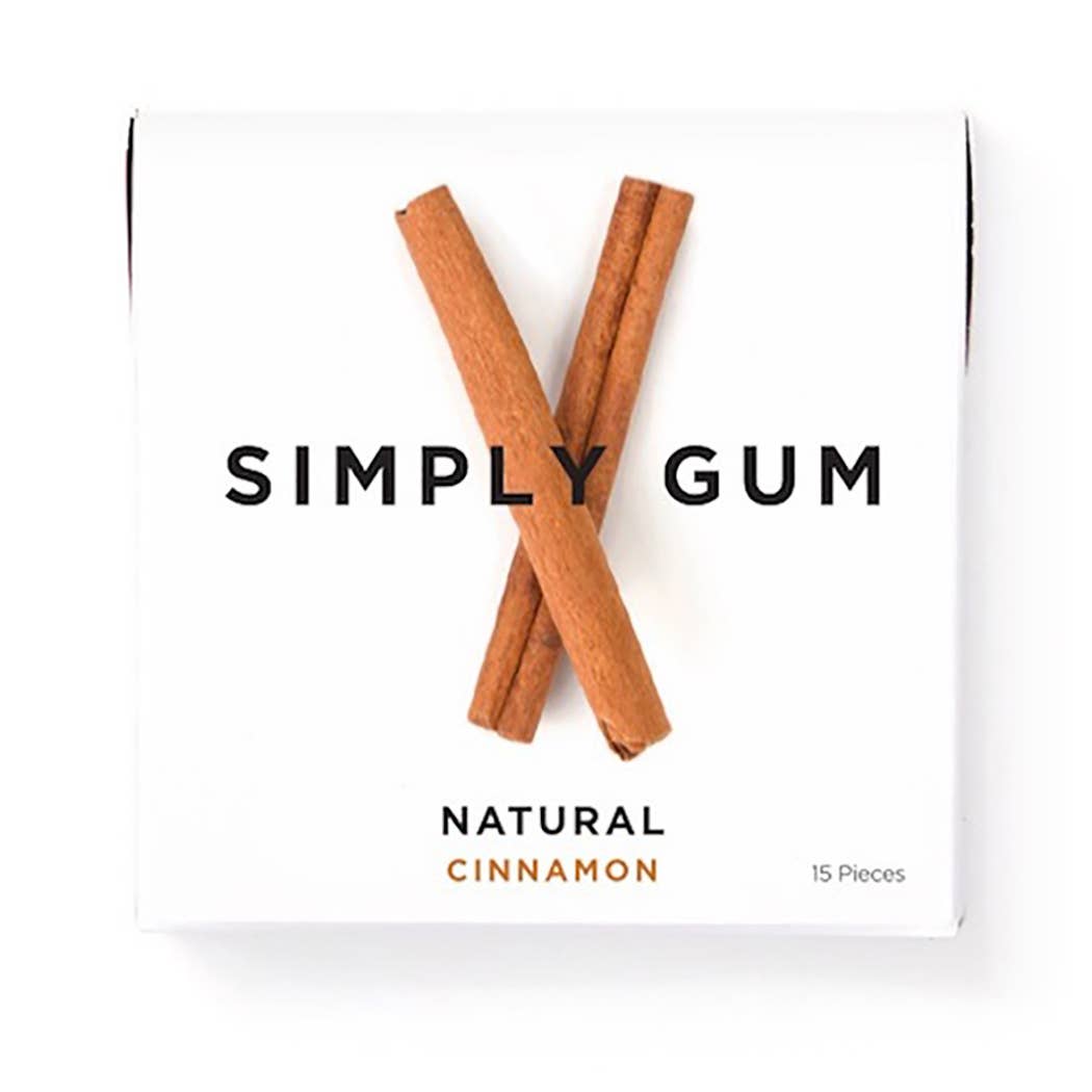 A box of Simply Gum - Cinnamon Natural Chewing Gum sticks. Close-up of spice. Box size: 2.5 x 2.5 x 0.6. Shelf life: 365 days. 15 pieces/box.