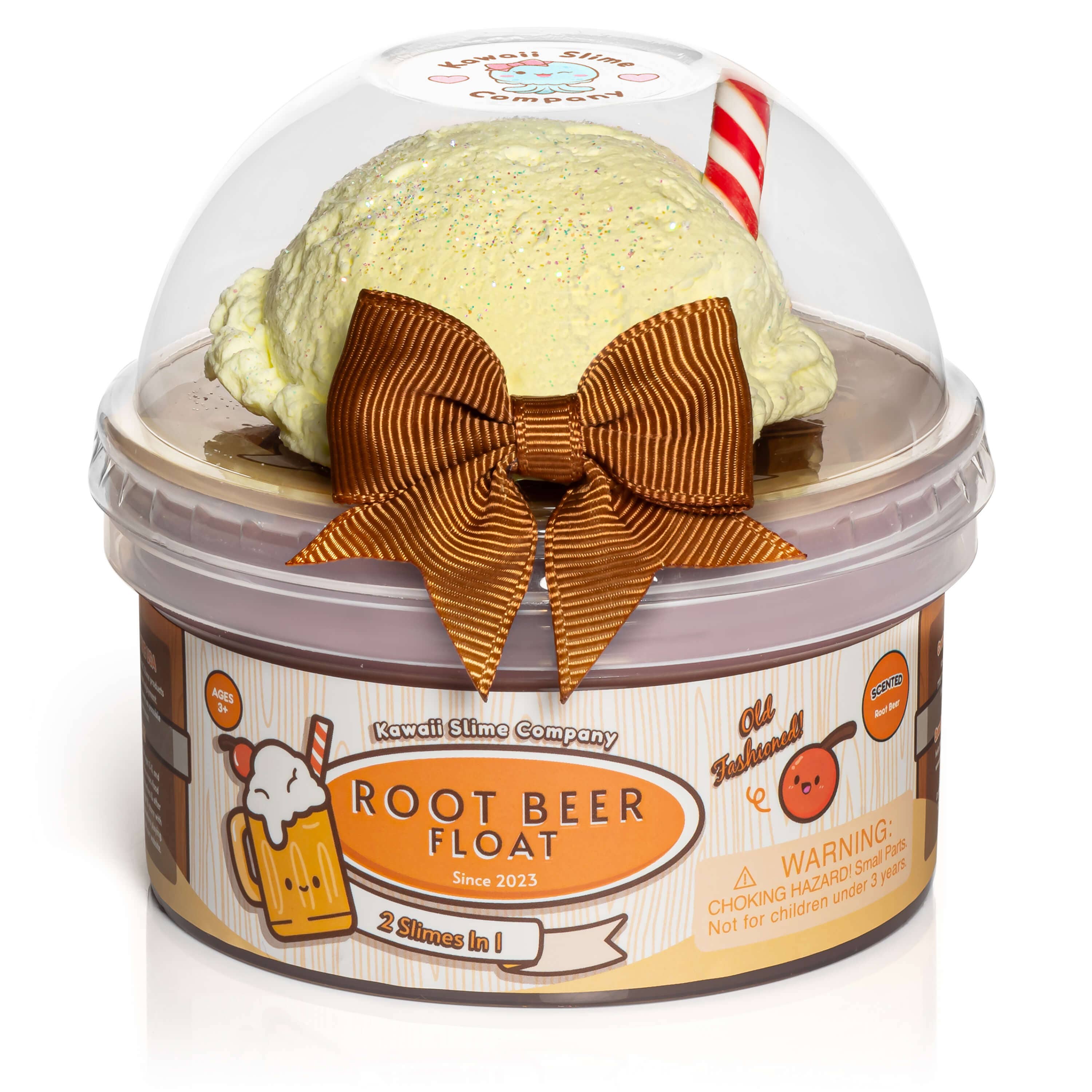 A glossy slime container with a root beer float theme, topped with ice cream scoop clay. Enhance your sensory experience with this scented treat.