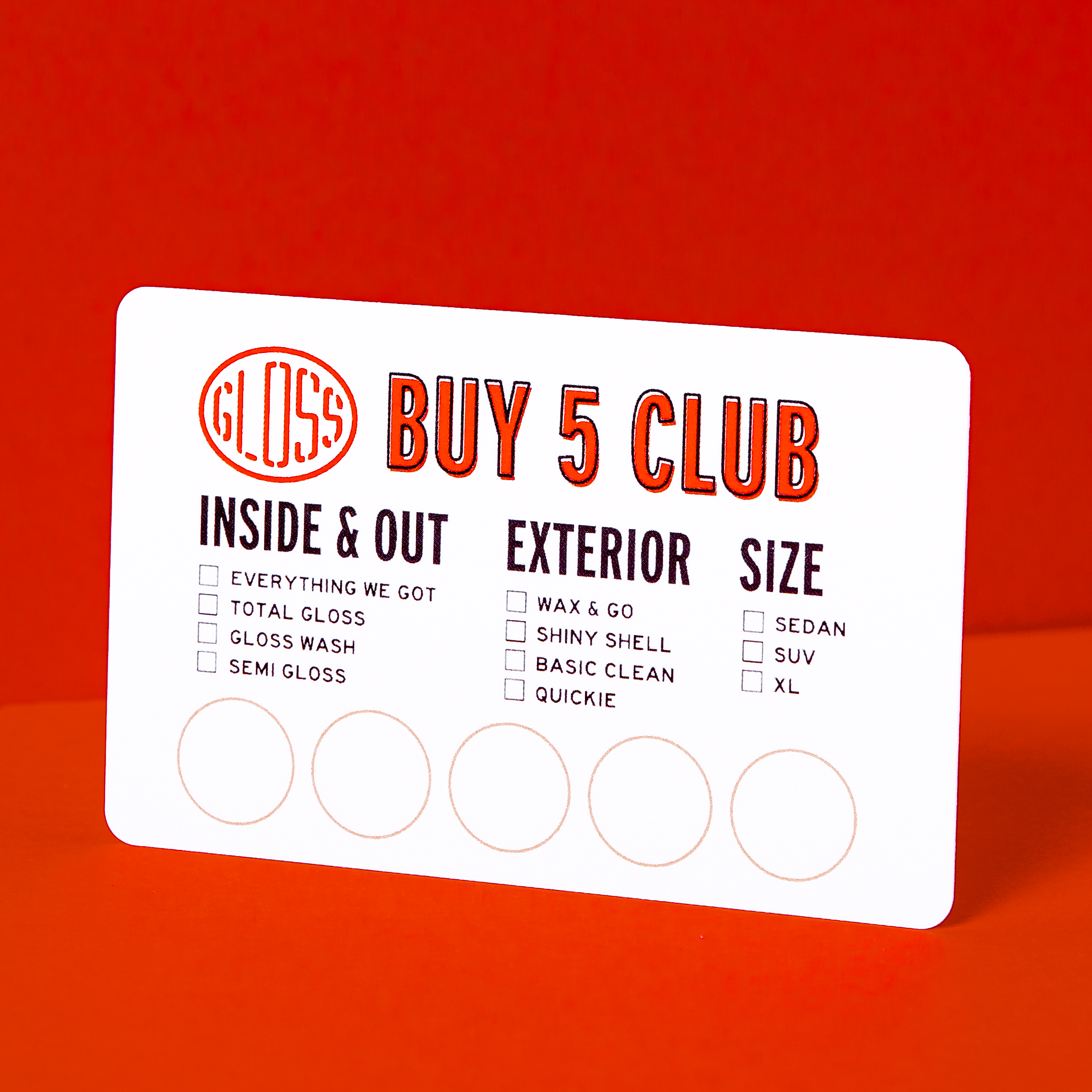A white card featuring red and black text, showcasing the Buy Five Card offer. Text reads: Save 10% when you join our Buy 5 Club. Image includes a red circle and a red and black logo.