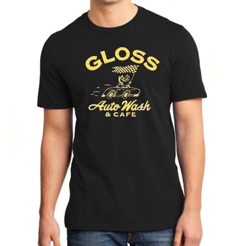 A man in a black shirt, showcasing the Gloss Wolf Metallic Gold T-shirt.