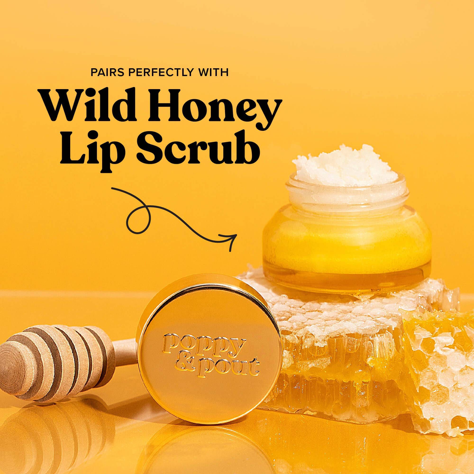 Hand-poured Wild Honey Lip Balm in eco-friendly packaging, showcasing honeycombs and a jar of honey. 100% natural, cruelty-free, double-sized balm by Poppy & Pout.