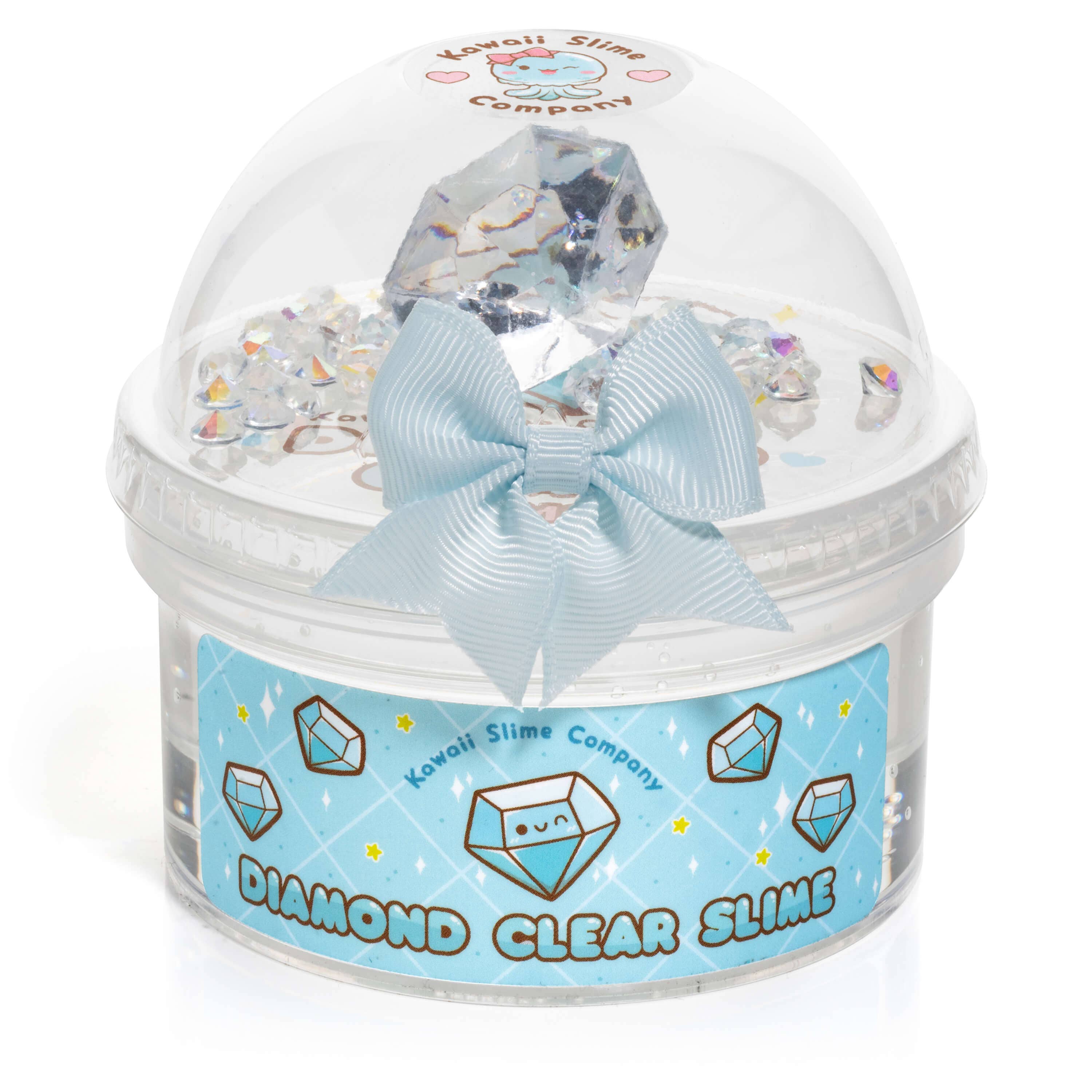 Clear plastic container with blue bow, clear lid, and diamond crystal. Diamond Clear Putty Slime includes crystal and iridescent rhinestones for poking and bubble pops.