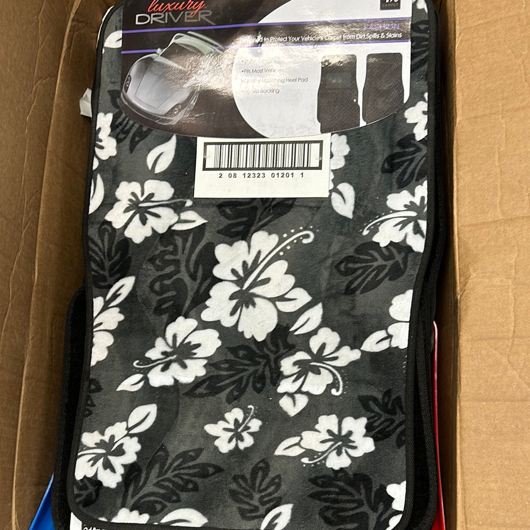 A black and white Hawaiian grey car mat set with floral design, displayed in a box.