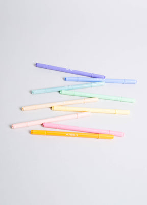 A group of dual tip pastel markers in various colors, including yellow, pink, and purple, showcasing their versatility and vibrant hues. The markers come in a box that doubles as a holder, adding convenience to your creative endeavors. Made in Italy.