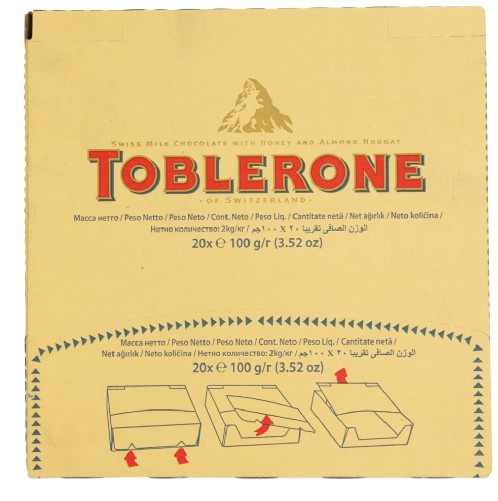 A box of Toblerone Swiss Milk Chocolate bars, European Import, with iconic triangular peaks, perfect for gifting on special occasions like birthdays and anniversaries.