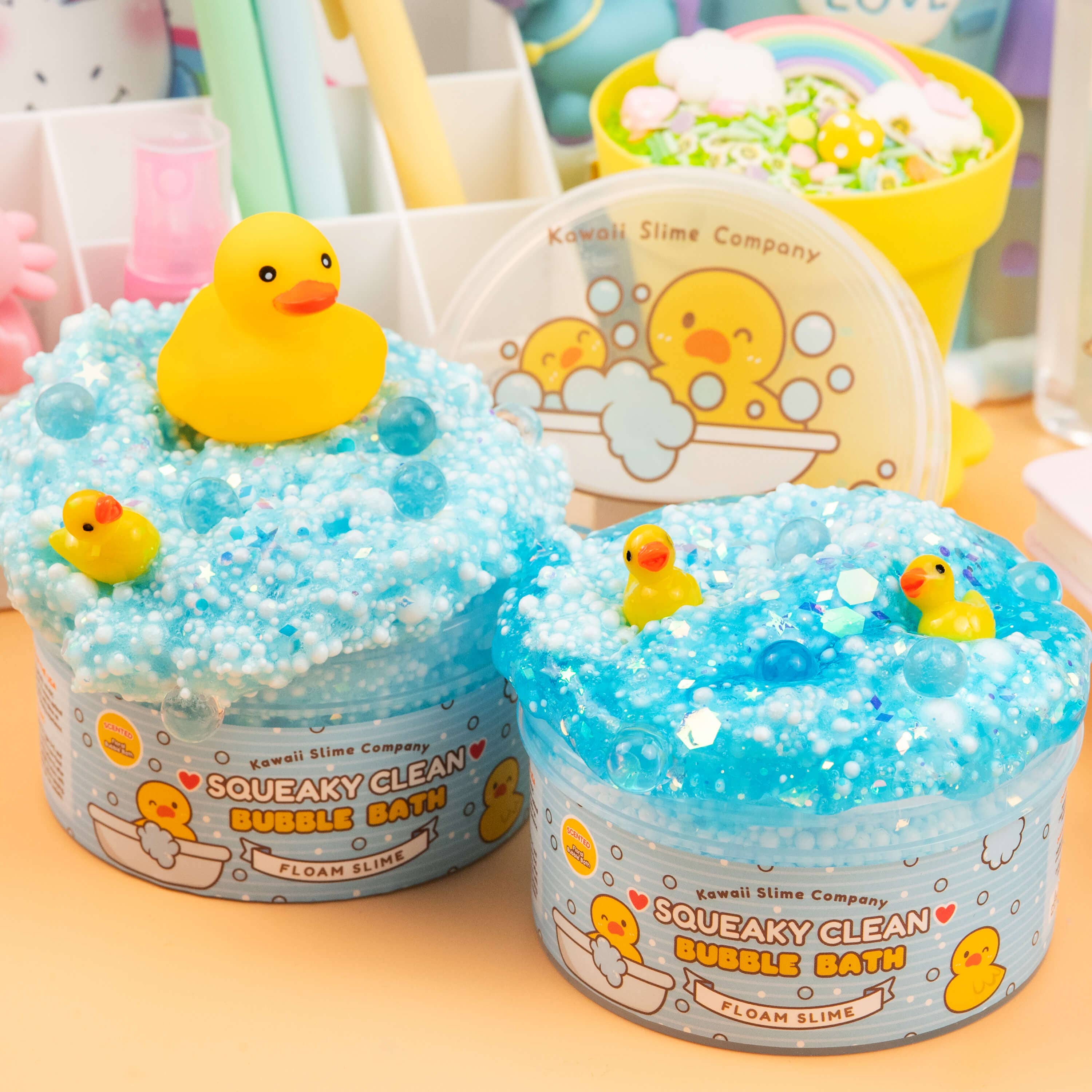 Squeaky Clean Bubble Bath Floam Slime featuring rubber duck toy, foam beads, glitter, and baubles. Floral scent for a fresh bath time experience.