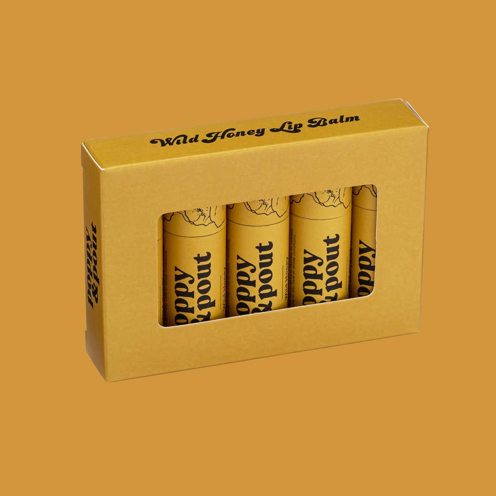 Hand-poured Wild Honey Lip Balm in eco-friendly cardboard tubes by Poppy & Pout. 100% natural, cruelty-free, double-sized balm. Tester included.