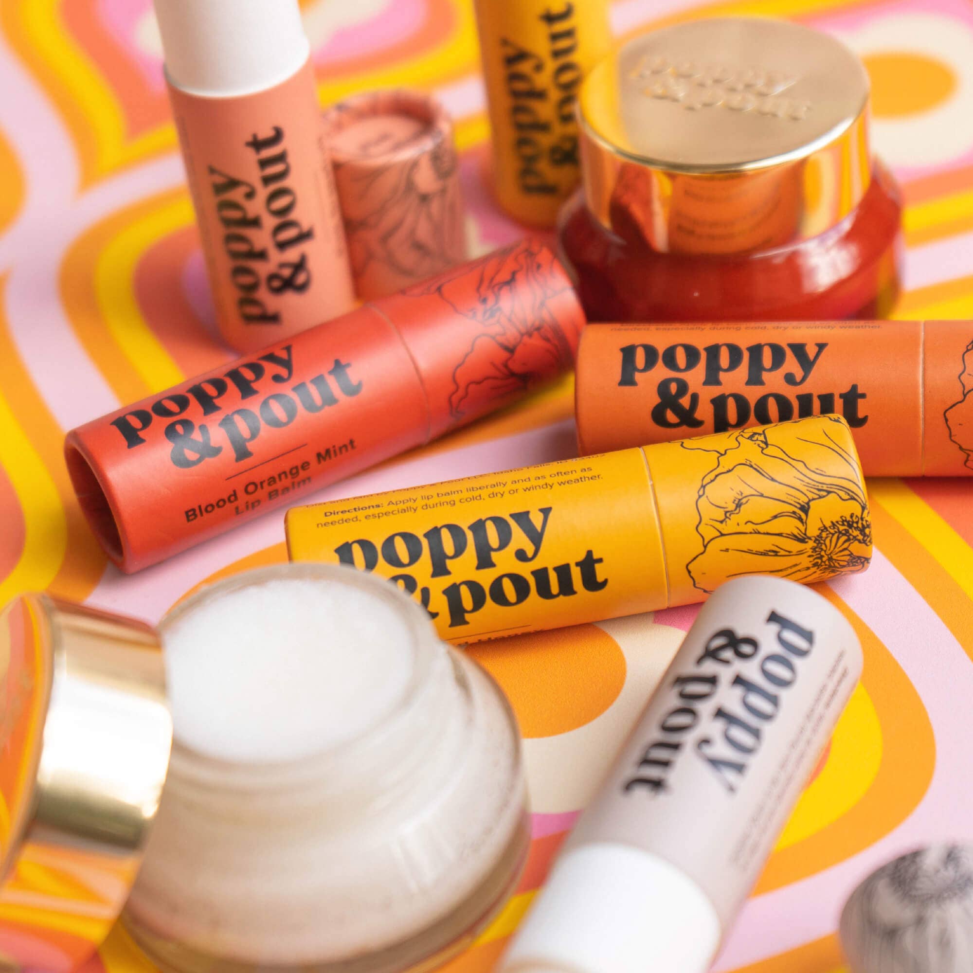 Hand-poured Wild Honey Lip Balm in eco-friendly tube by Poppy & Pout. 100% natural, cruelty-free, double-sized balm for hydrated lips.