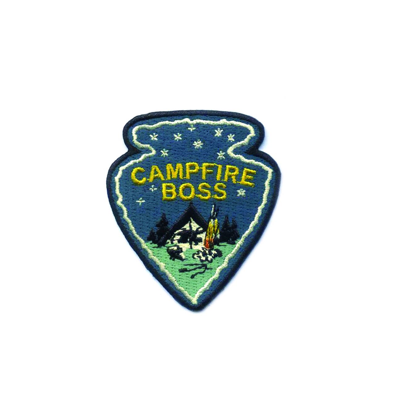 Embroidered Campfire Boss iron-on patch, featuring text, emblem, and badge symbols. Measures approx. 2.25x3. Machine washable with iron-on adhesive for easy application. Recommended sewing for extra durability.