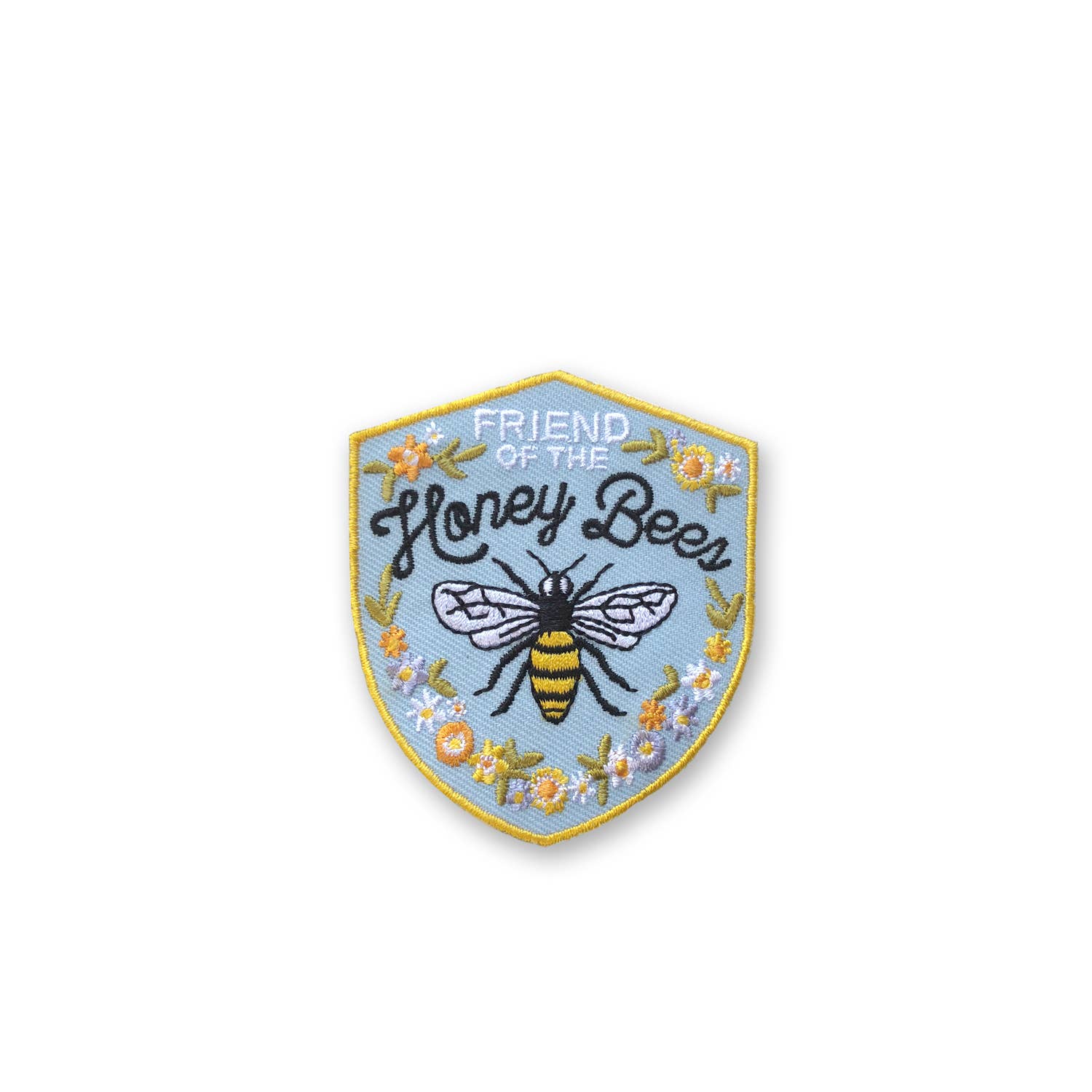 Embroidered Honey Bee Patch, emblem with bee detail, approx. 2.75x2.33. Close-up of bee on fabric, iron-on adhesive for easy application, advised sewing for durability.