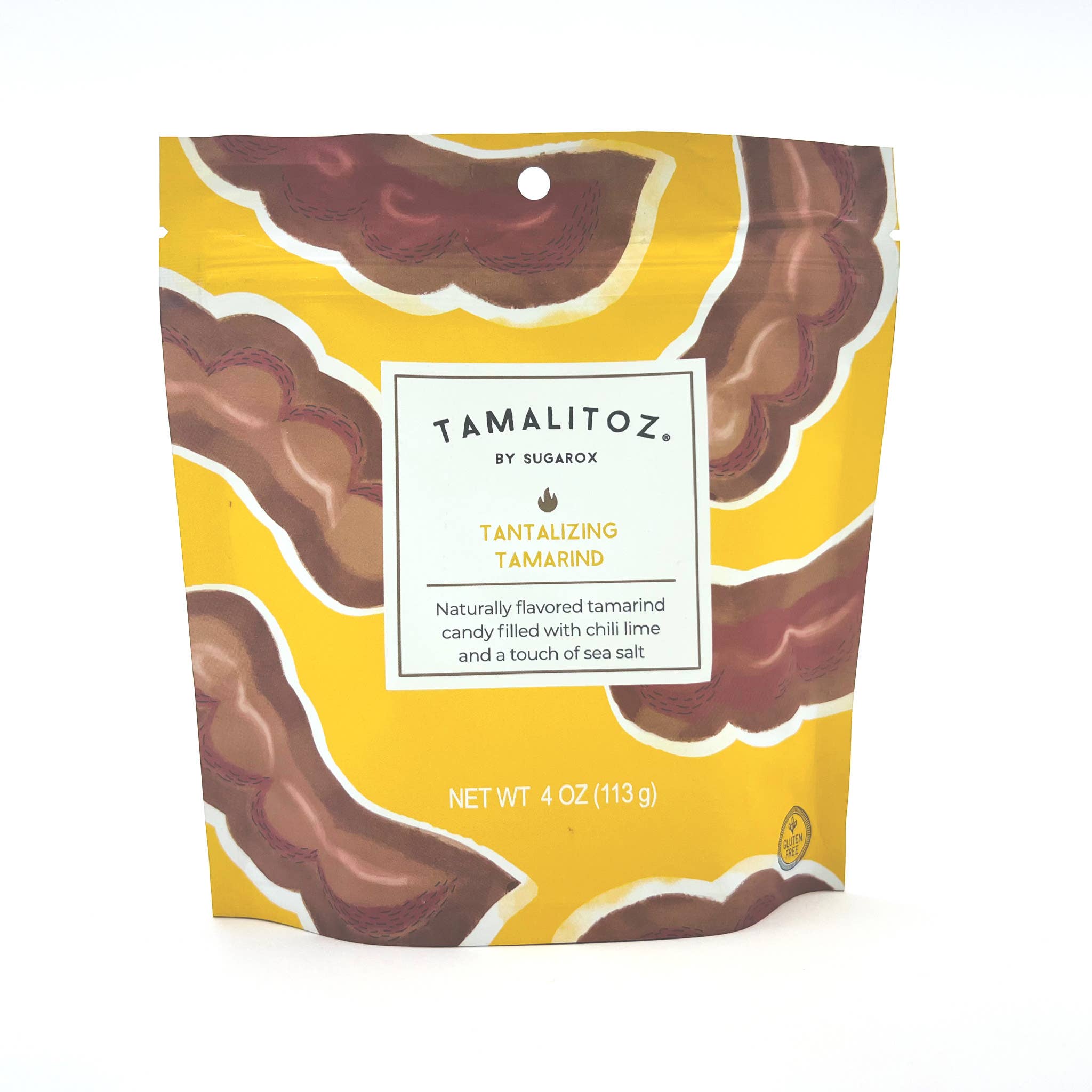 Handcrafted Tantalizing Tamarind Tamalitoz Candy by Sugarox Candy Studio LLC. Spicy, natural ingredients, kosher, nut-free, gluten-free. Image: Yellow bag with food items and label.