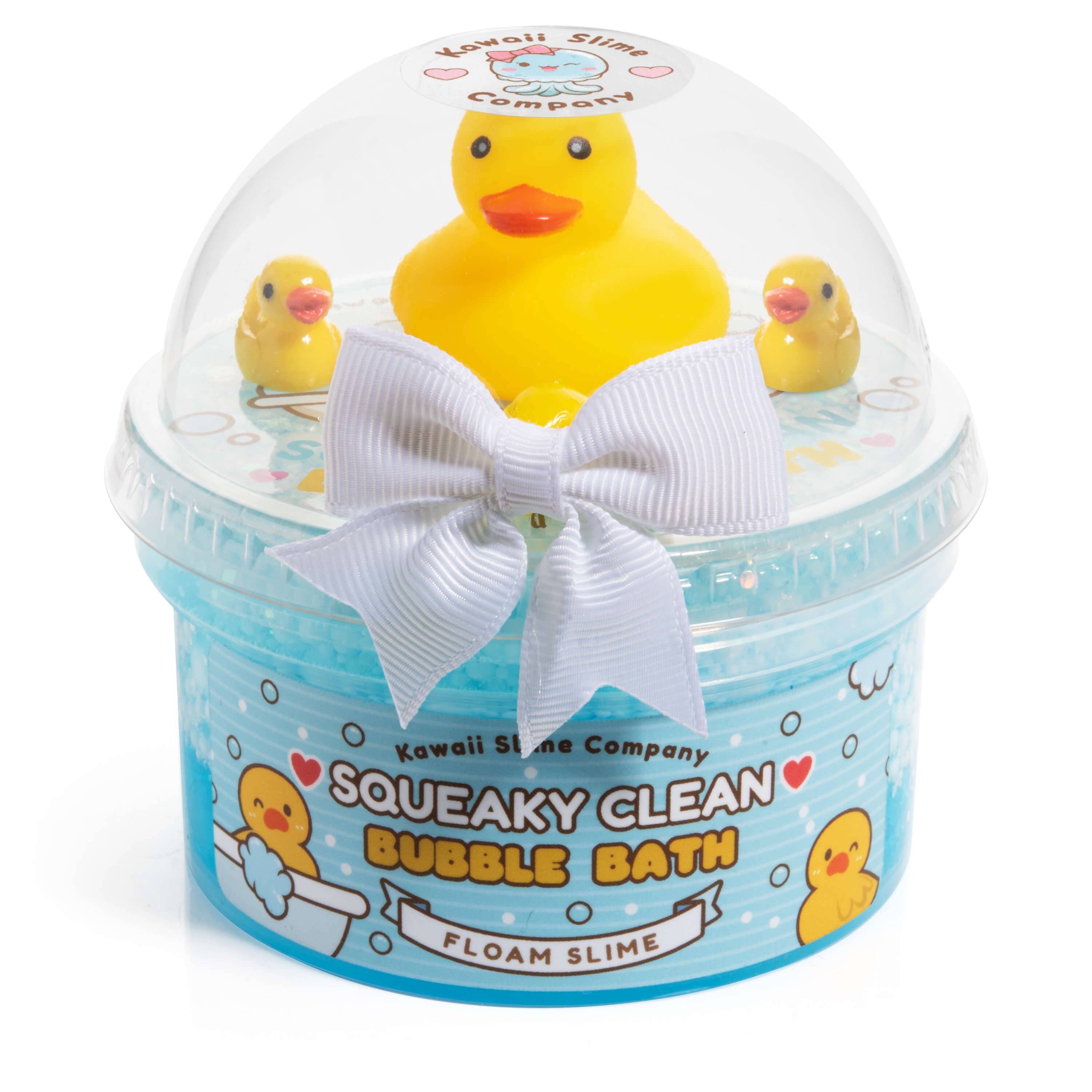 A yellow rubber duck toy in a tub of Squeaky Clean Bubble Bath Floam Slime, featuring foam beads, glitter, and a floral scent for a fun bath time experience.