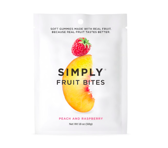 A white package of Fruit Bites featuring a peach and raspberry. Close-ups of fruit and raspberry. Chewy, real fruit snack with no artificial flavors. Bag size: 1.8 oz.