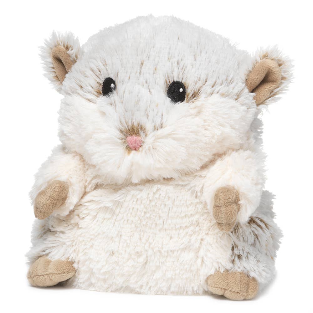 A 13 Hamster Warmies plush toy, ideal for all ages. Microwavable for warmth, scented with French lavender for relaxation. Surface clean only.