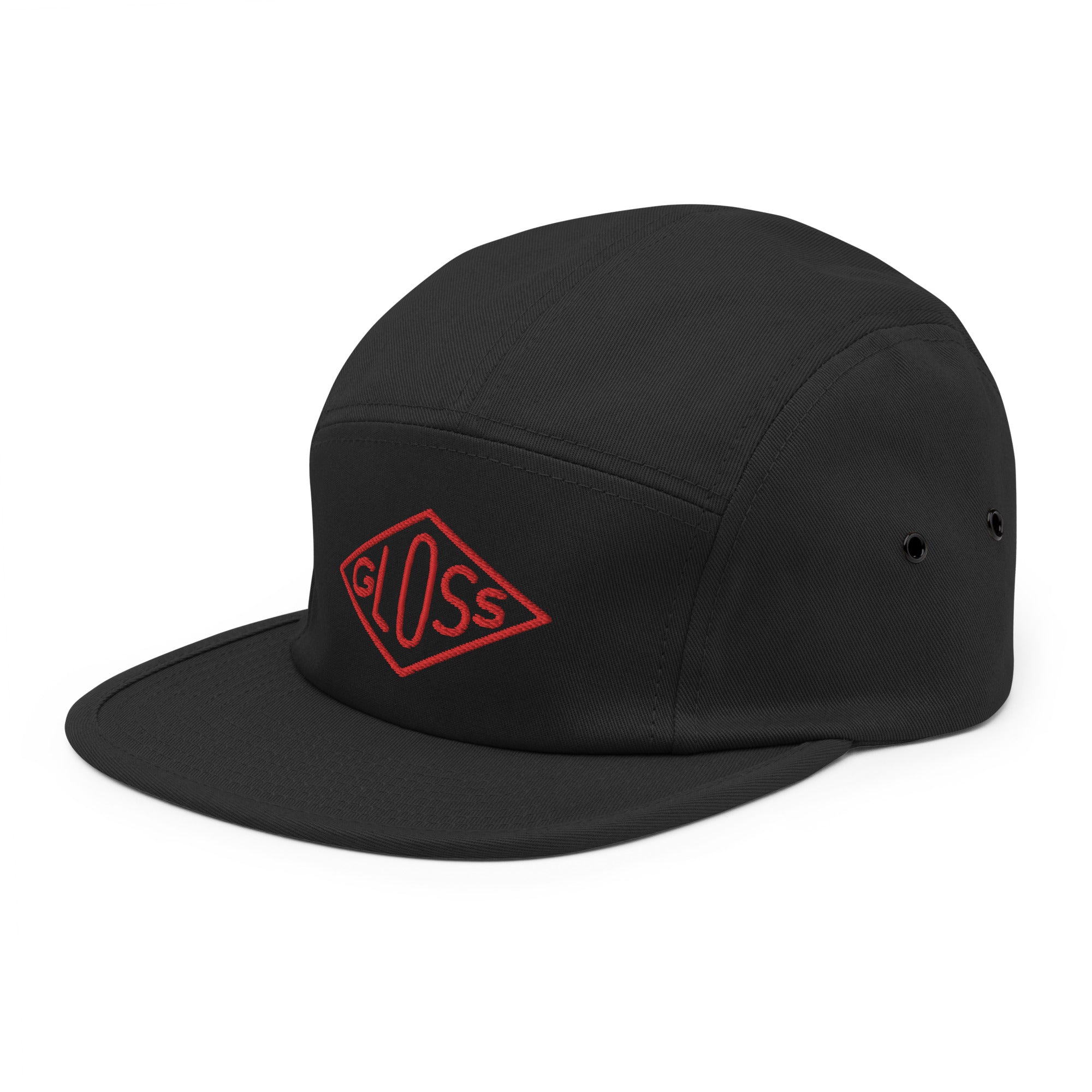 A black five-panel cap with a red logo, featuring a low profile and nylon strap clip closure. Classic and comfortable 100% cotton hat with metal eyelets.