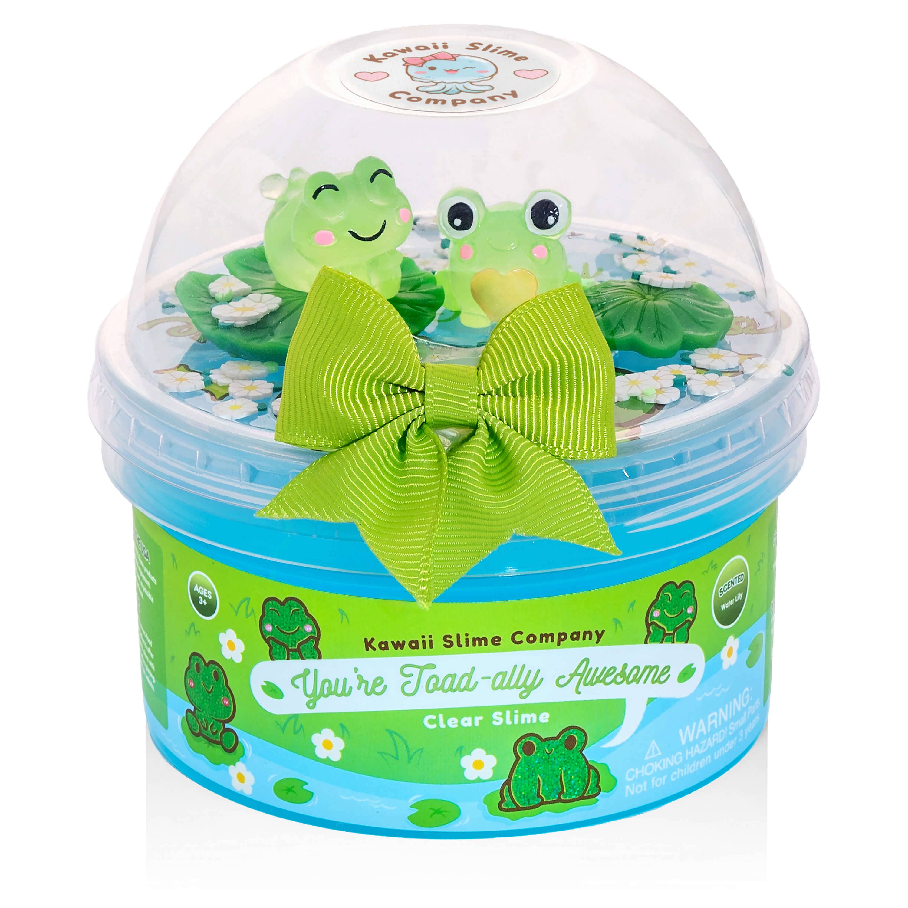 A plastic tub with frog toys inside, featuring two adorable toad charms, part of the You're Toad-ally Awesome Clear Slime set.