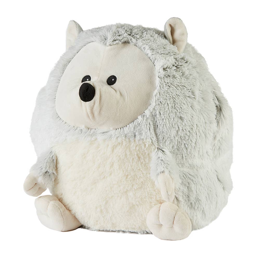 A supersized hedgehog hand Warmie, a plush hand warmer and pillow, scented with French lavender. Microwave for warmth or chill for cooling relief. Ideal for all ages.