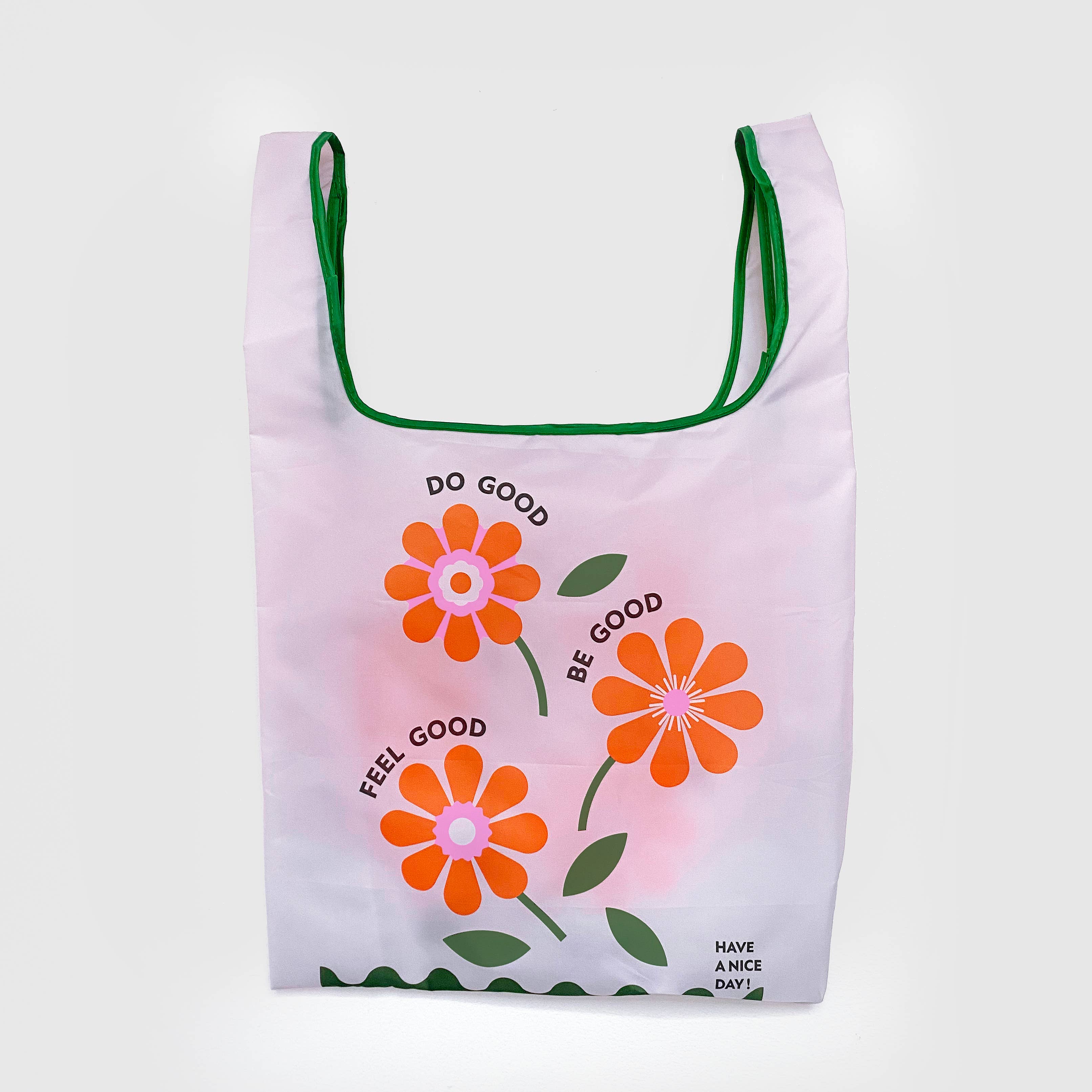 Feel Good Reusable Nylon Bag featuring orange flowers on a white background. Foldable, 100% Nylon, 25 x 14 x 5.