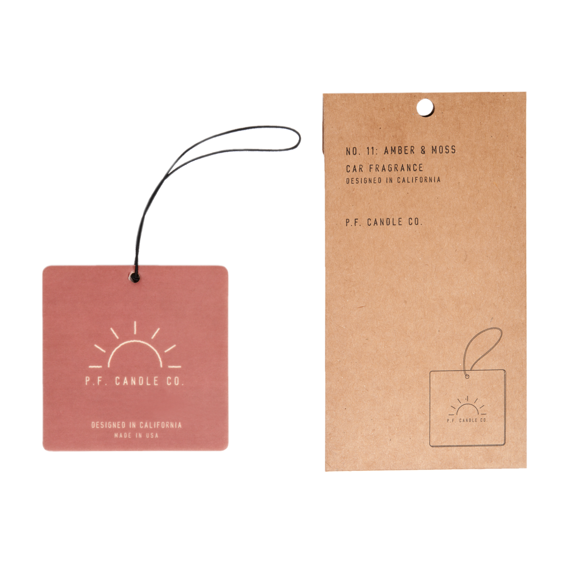 A close-up of P.F. Car Fragrance tag with text, inspired by travel nostalgia. Sold as a case pack of 12. Notes of sage, moss, and lavender.