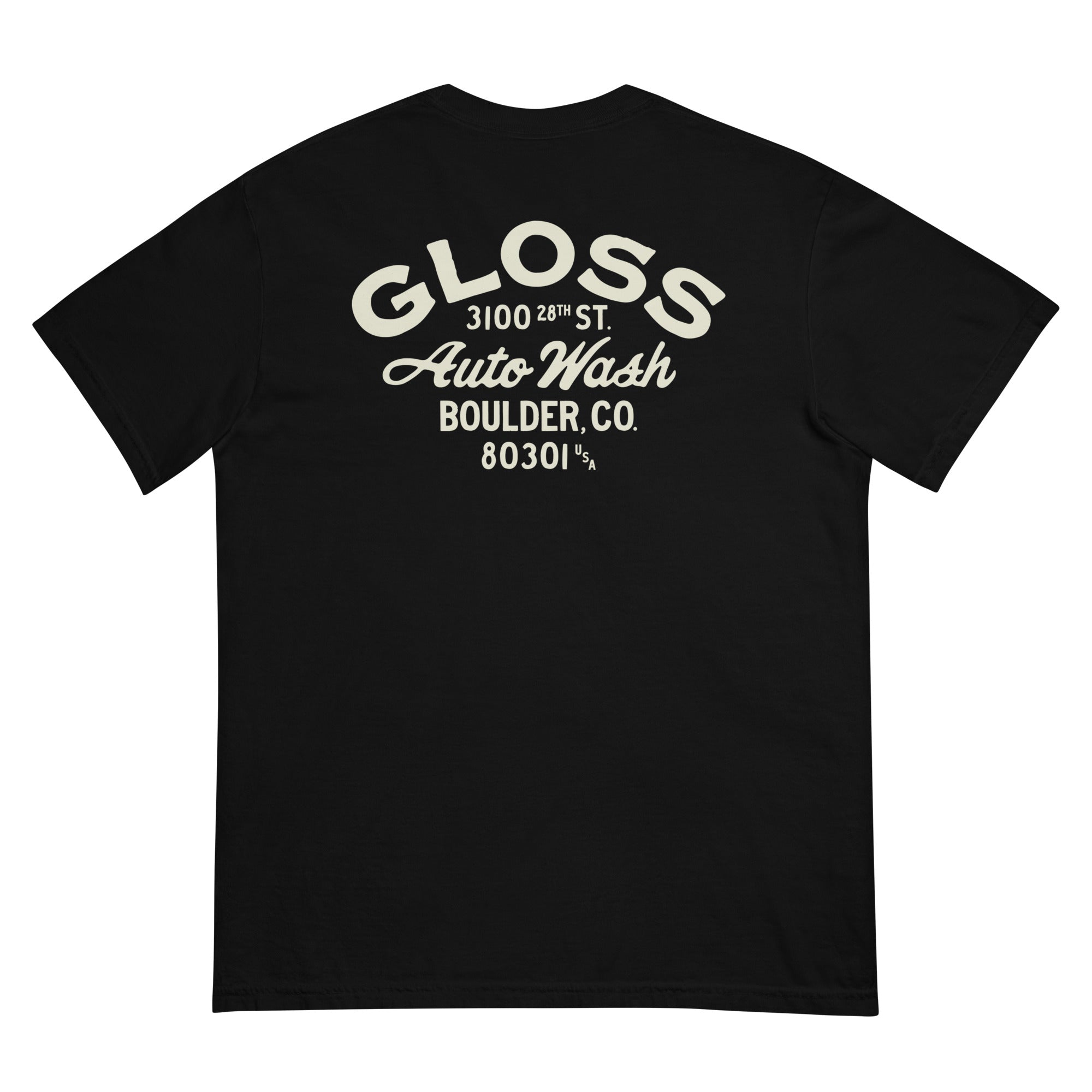 A men's Gloss T-shirt in black with white text. Made of 100% ring-spun cotton, garment-dyed, featuring a relaxed fit and double-needle detailing for durability.